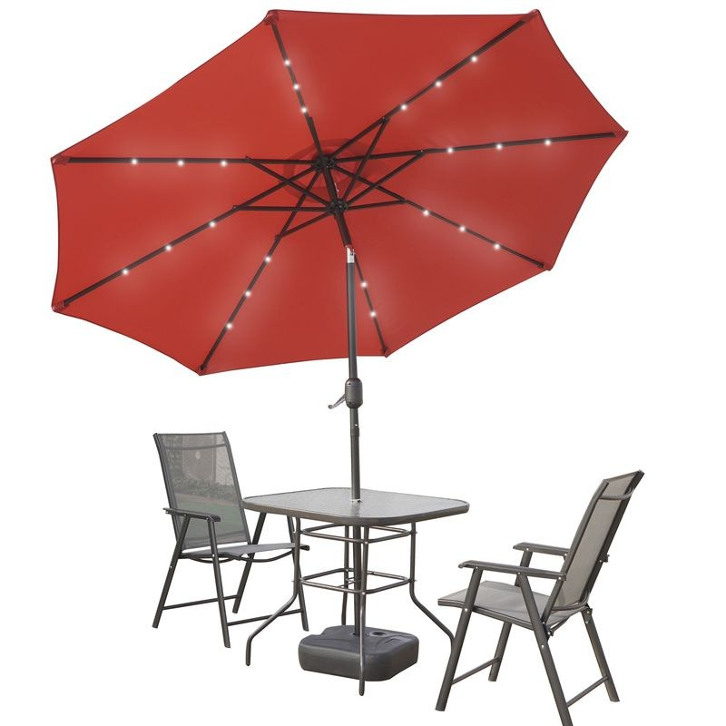 LeisureMod Sierra Outdoor Patio Umbrella with Base in Red Tilted.