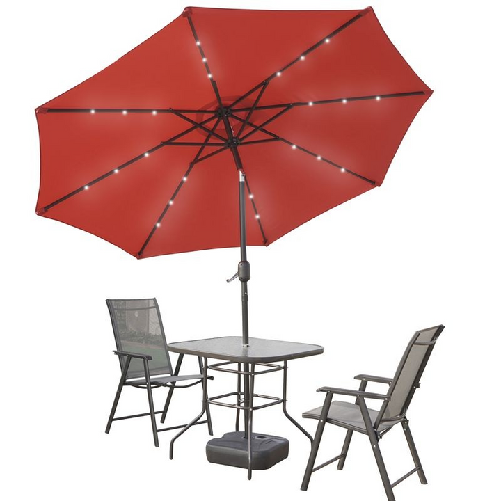 LeisureMod Sierra Outdoor Patio Umbrella with Base in Red Tilted.