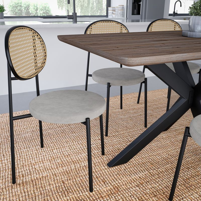 LeisureMod Euston Modern Wicker Dining Chair with Velvet Round Seat Grey at Table.