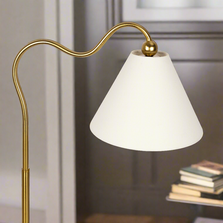 Ornate Brass Ring Base Curved Table Lamp with Triangle White Drum Shade Zoomed.