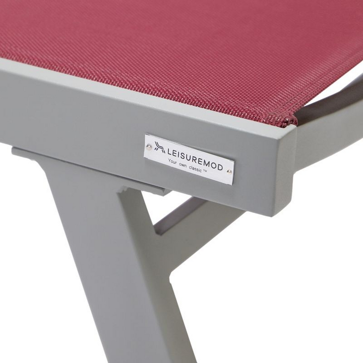 LeisureMod Marlin Patio Chaise Lounge Chair with Armrests in Grey Aluminum Frame, Set of 2 in Burgundy Closeup.