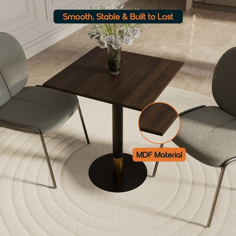 LeisureMod Vail Collection Dining Table Black/Gold Base With 24" Square Dark Brown MDF Top in Room.