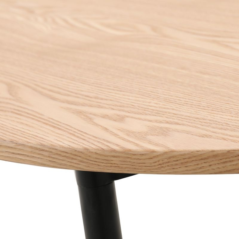 LeisureMod Tule Modern 71" Oval Dining Table with MDF Top and Black Steel Legs in Natural Wood Closeup.
