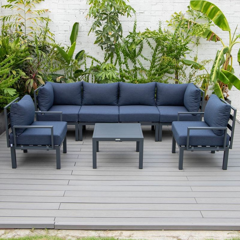 LeisureMod Chelsea 7-Piece Patio Sectional and Coffee Table Set Black Aluminum with Cushions Blue Photo.