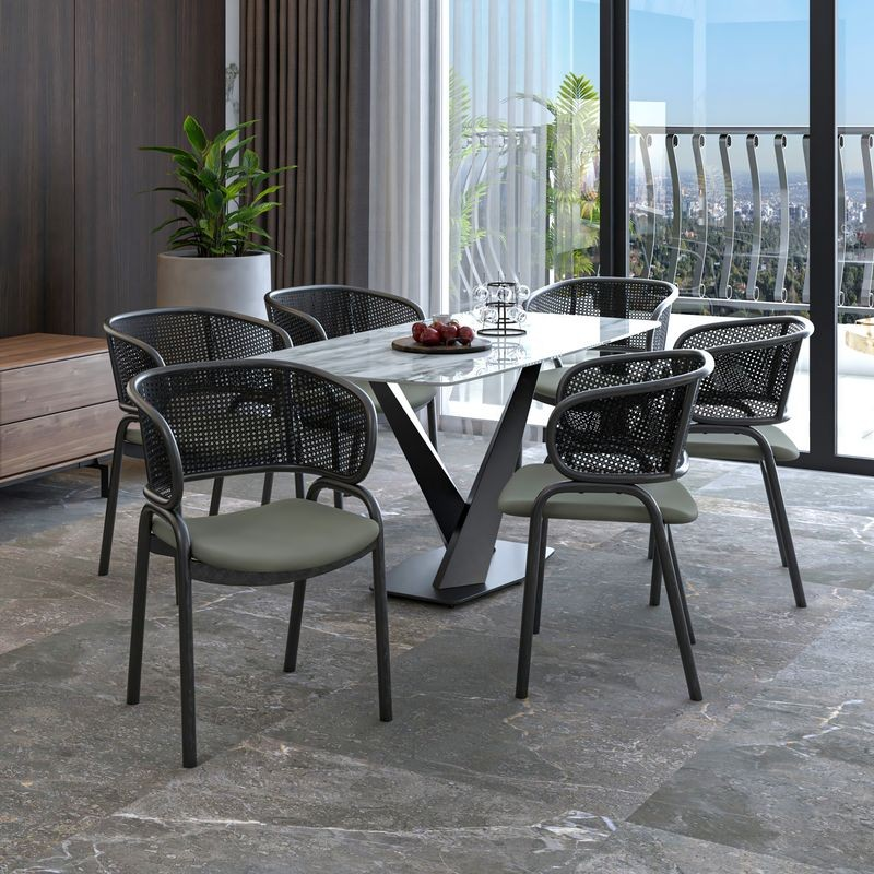 LeisureMod Ervilla Dining Armchair in Black Steel Frame with Black Wicker Back and Grey Seat at Table.
