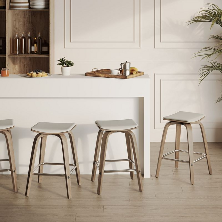 LeisureMod Wooden Counter Stool Square Seat Pelya Collection Modern Style Washed Walnut color in Light Grey at Bar.