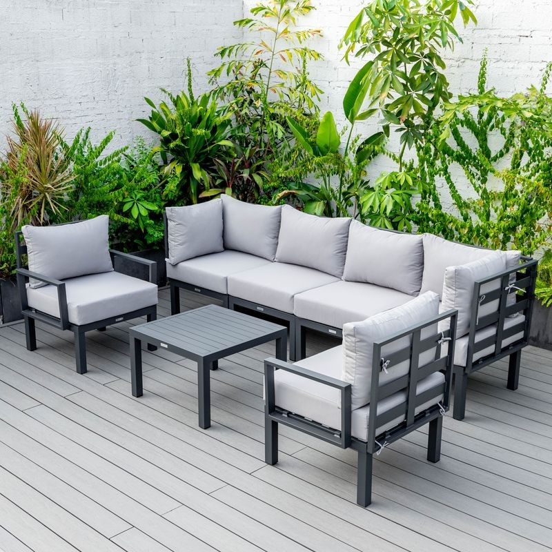 LeisureMod Chelsea 7-Piece Patio Sectional and Coffee Table Set Black Aluminum with Cushions Light Grey