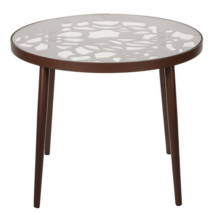 Round table with decorative glass top and wooden legs on a white background.