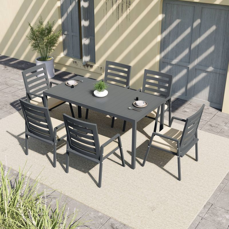 LeisureMod Marlin Extendable outdoor Dining Table 78-118 in Black on Patio.