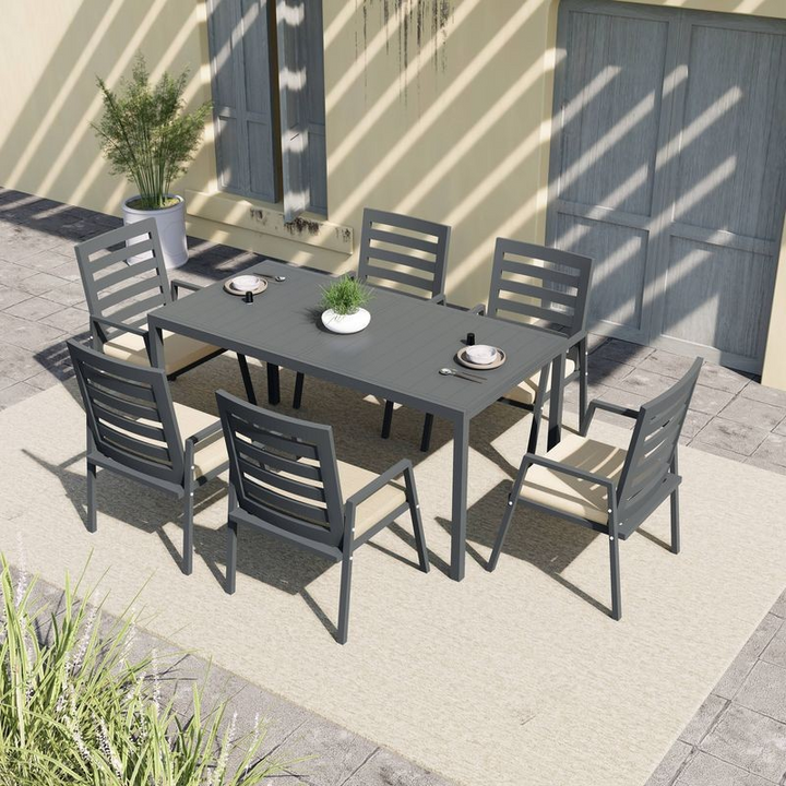 LeisureMod Marlin Extendable outdoor Dining Table 78-118 in Black on Patio.