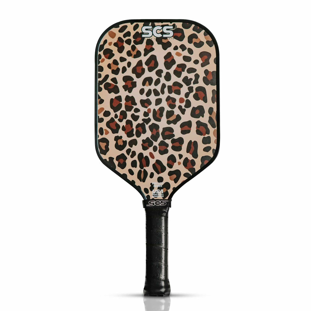Leopard print pickleball paddle with black handle on a white background.