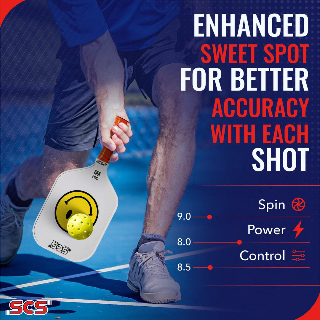 Person holding a paddle with a pickleball on a blue court, promoting better accuracy with each shot.