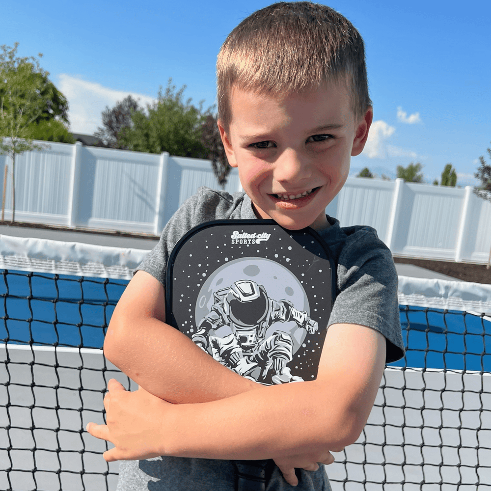 Astro Junior Series Kids Pickleball Paddle with Boy.