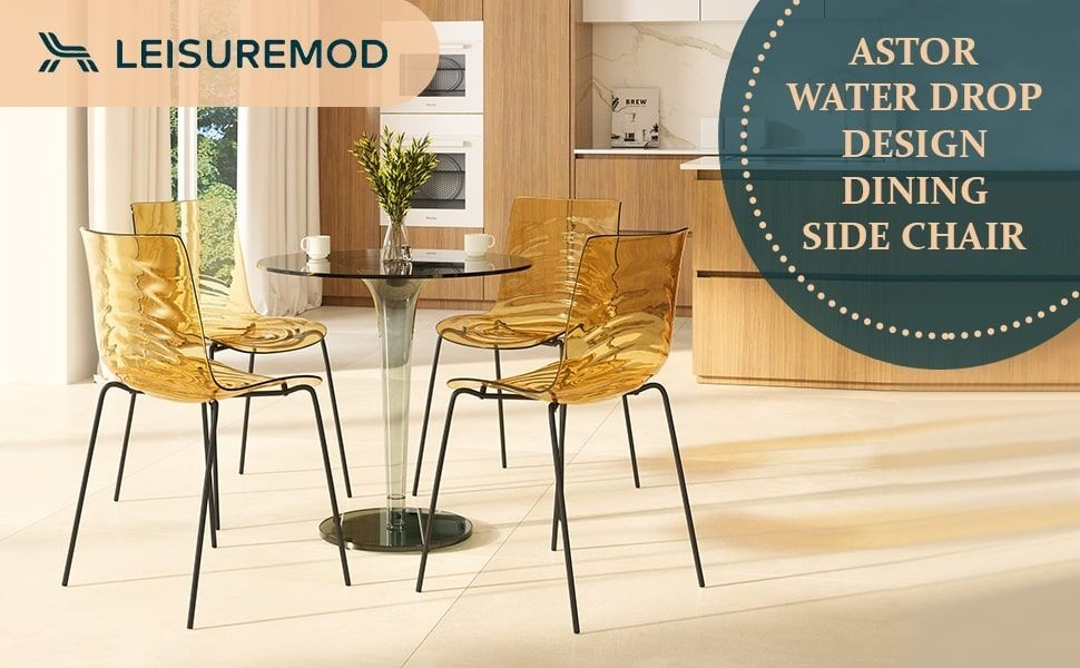 Dining area with yellow chairs and a table, featuring the LeisureMod brand.
