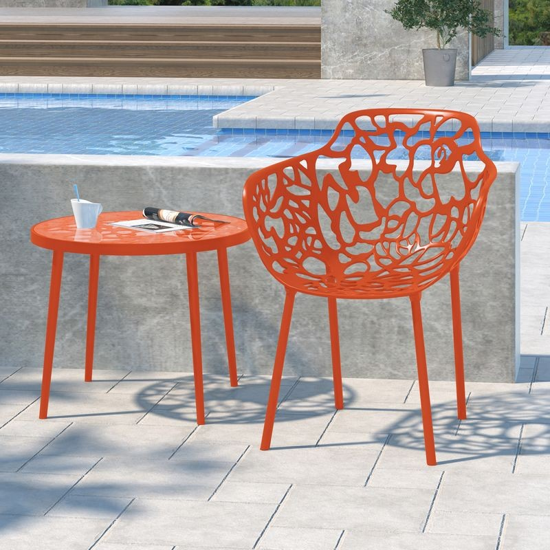 LeisureMod Modern Devon Aluminum Armchair Orange at Table.