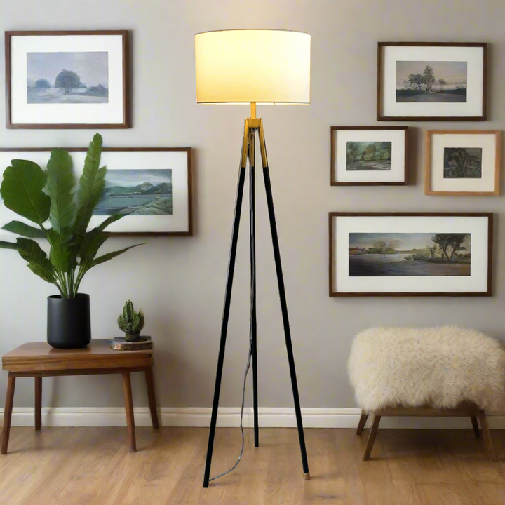 Sway Brass Gold Floor Lamp with On and Off Switch Triple Legs White Fabric Shade Light On.