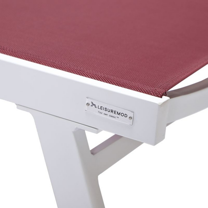 LeisureMod Marlin Patio Chaise Lounge Chair with Armrests in White Aluminum Frame Burgundy Closeup.