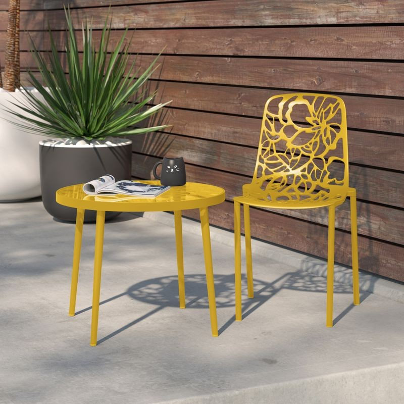LeisureMod Modern Devon Aluminum Chair Yellow at Table.