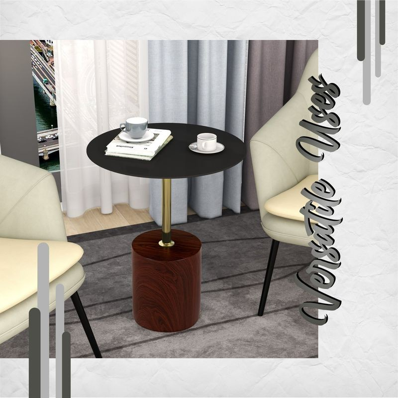 Small round table with a black top and brown base in a room with chairs and curtains.