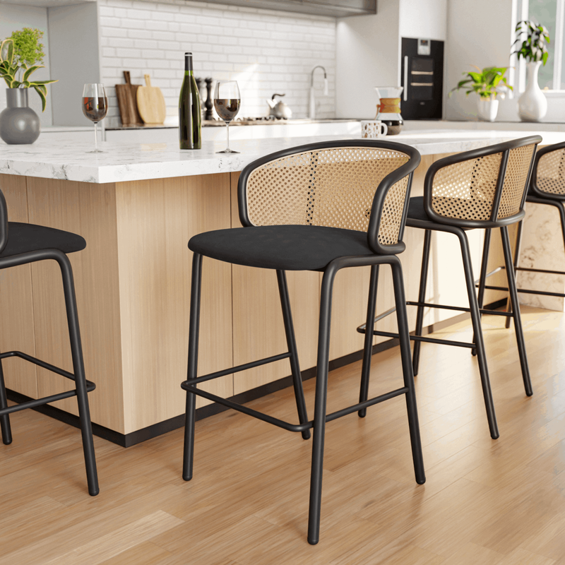 LeisureMod Ervilla Mid-Century Modern Wicker Bar Stool with Fabric Seat and Black Powder Coated Steel Frame in Black at Bar.