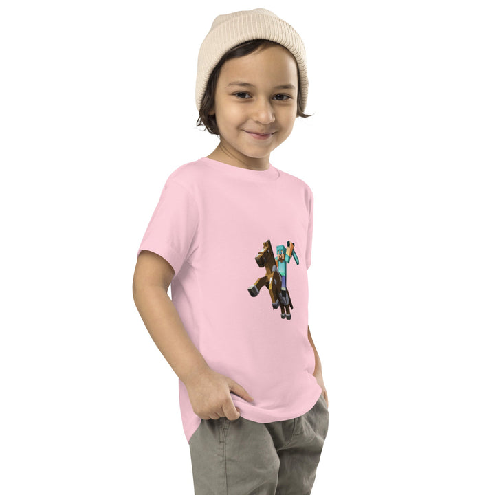 Child wearing a pink t-shirt with a graphic design on a white background.