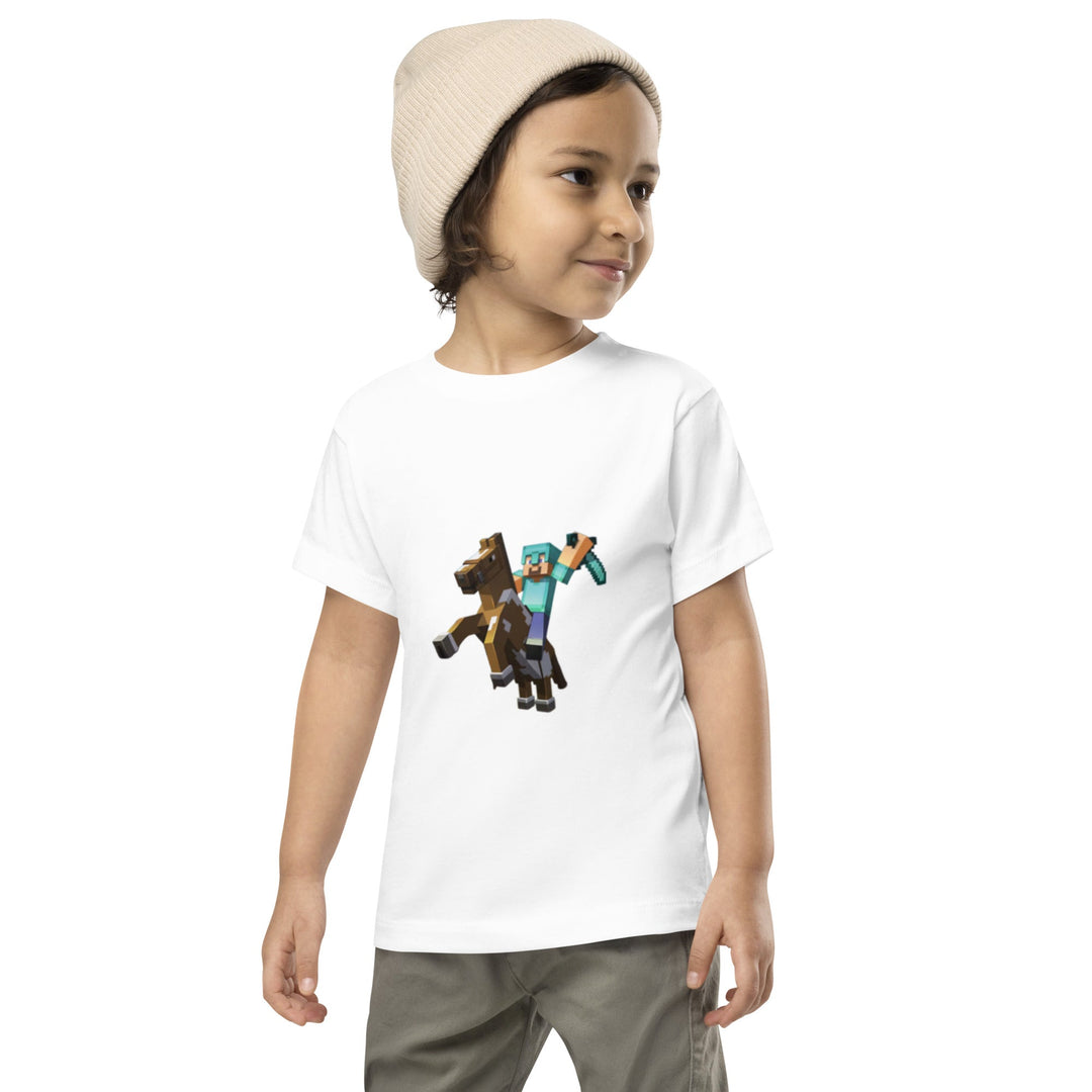 Child wearing a white t-shirt with Minecraft character design on a white background.