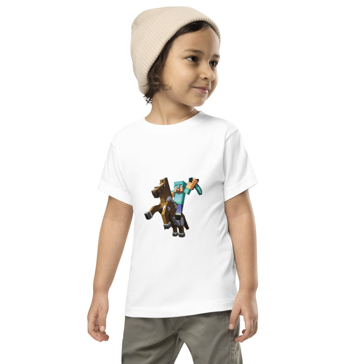 Child wearing a white t-shirt with Minecraft character design on a white background.