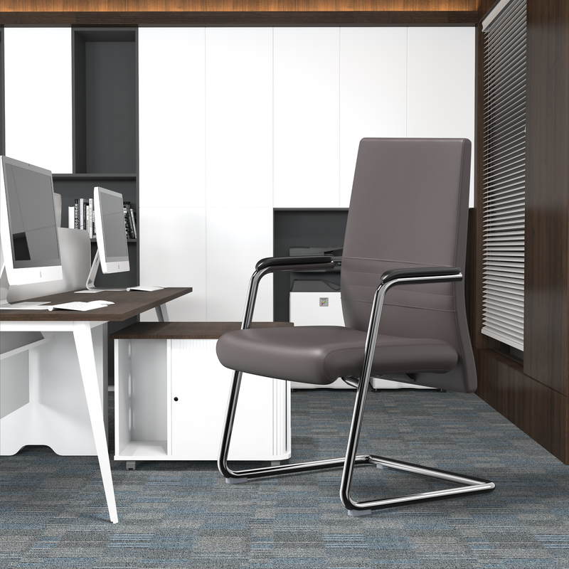 LeisureMod Aleen Series Guest Office Chair in Grey Leather at Desk.