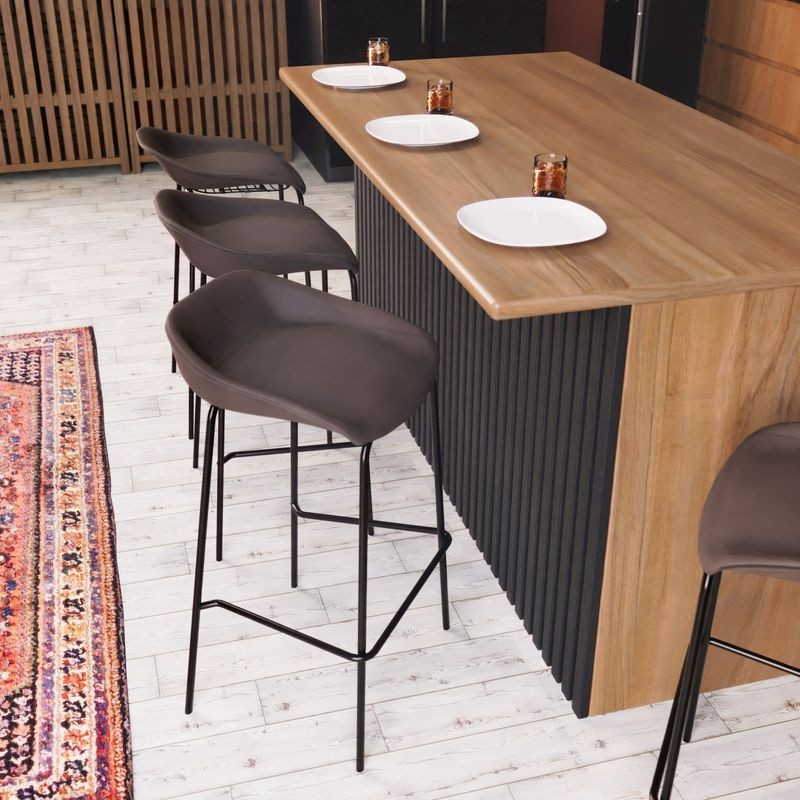 LeisureMod Servos Modern Barstool with Upholstered Faux Leather Seat and Powder Coated Iron Frame in Elephant Grey at Bar.