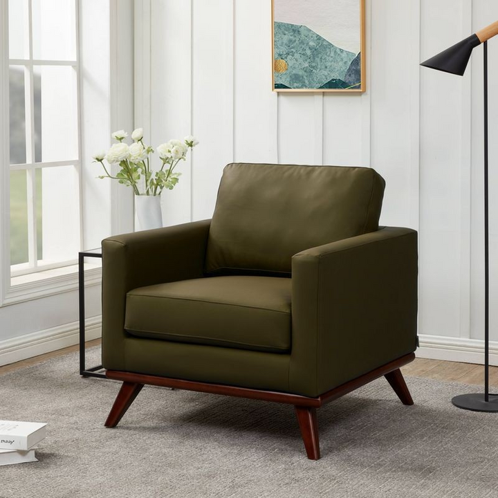 LeisureMod Chester Modern Faux Leather Accent Armchair in Green Leather with Background.