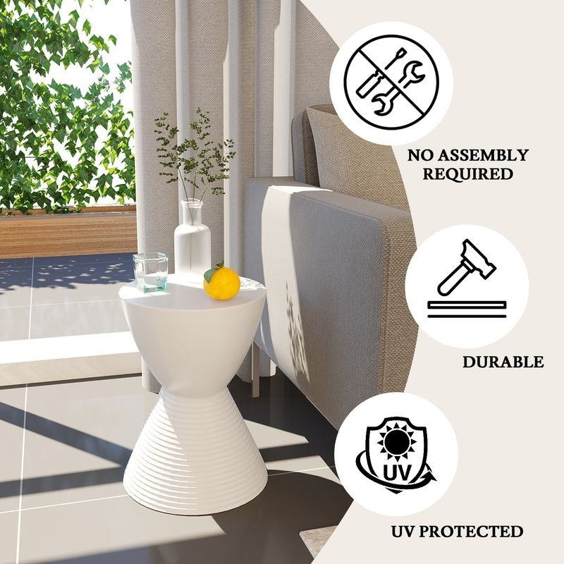 LeisureMod Modern Round Boyd Side Table White by Couch.