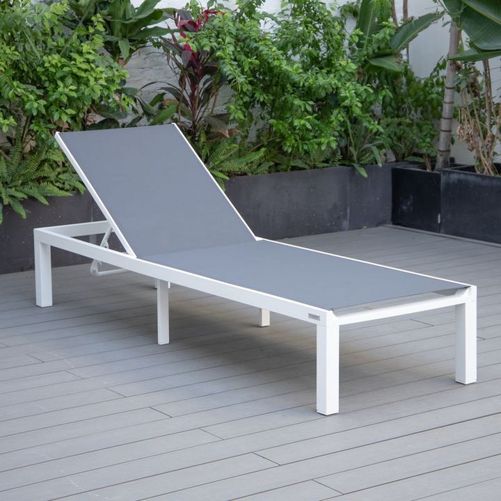 LeisureMod Marlin Modern Aluminum Outdoor Patio Chaise Lounge Chair Set of 2 with Square Fire Pit Side Table Perfect for Patio, Lawn, and Garden Dark Grey on Deck.
