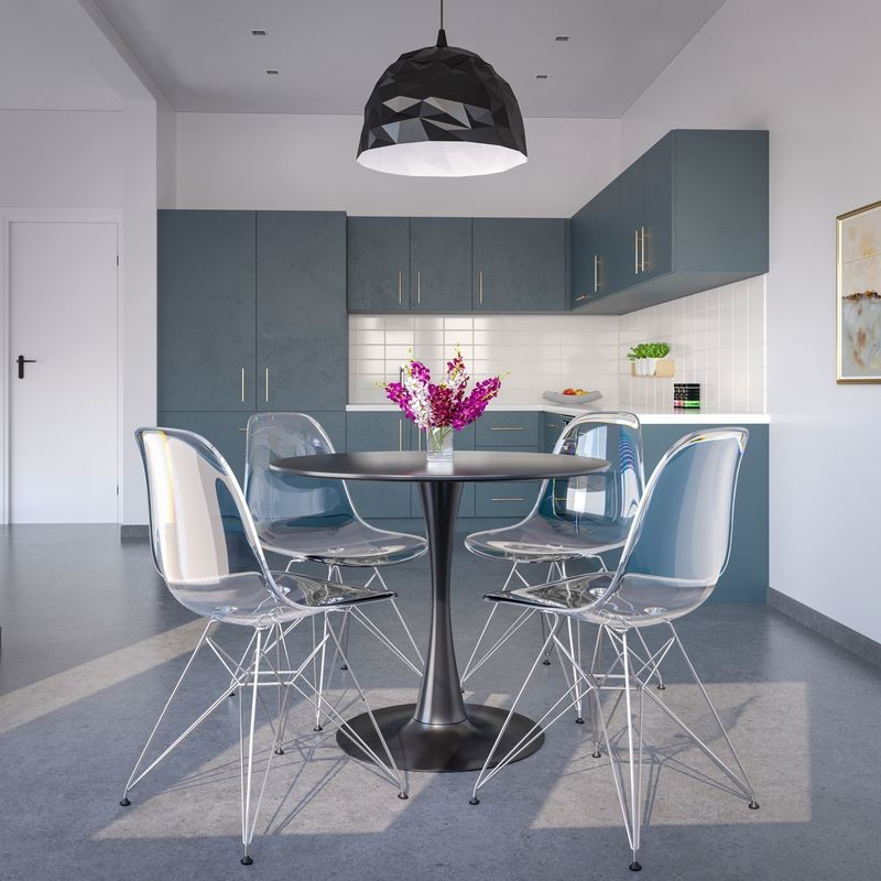 LeisureMod Cresco Molded Eiffel Side Chair Clear at Table.