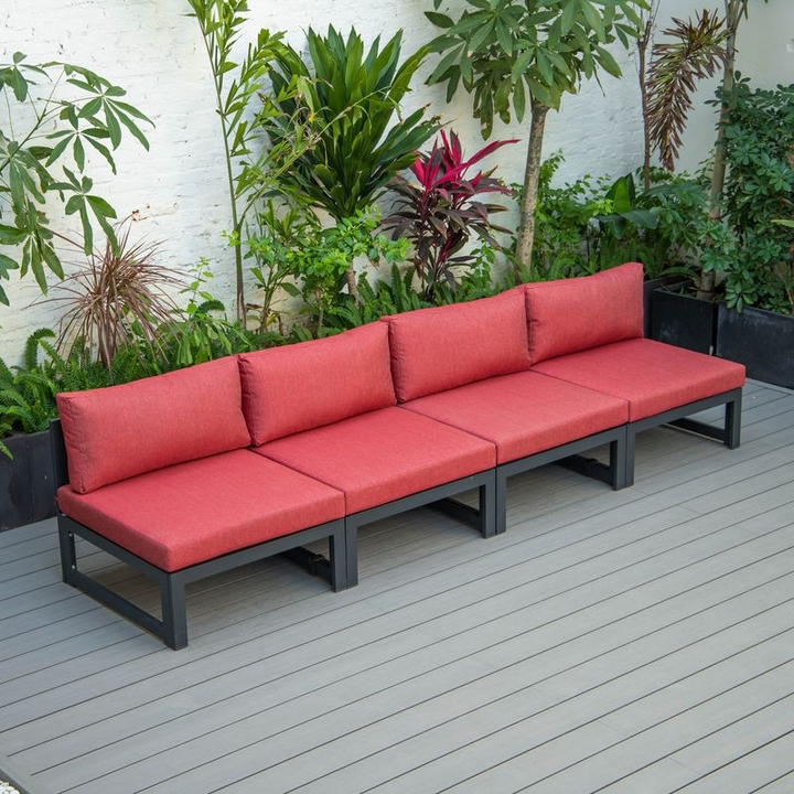 LeisureMod Chelsea 4-Piece Middle Patio Chairs Black Aluminum with Cushions Red on Deck.