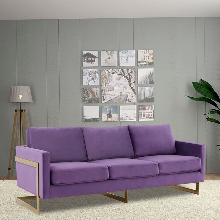 LeisureMod Lincoln Modern Mid-Century Upholstered Velvet Sofa with Gold Frame Purple with Background.