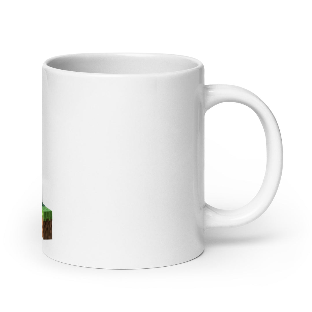 White mug with a small green and brown design on a white background.