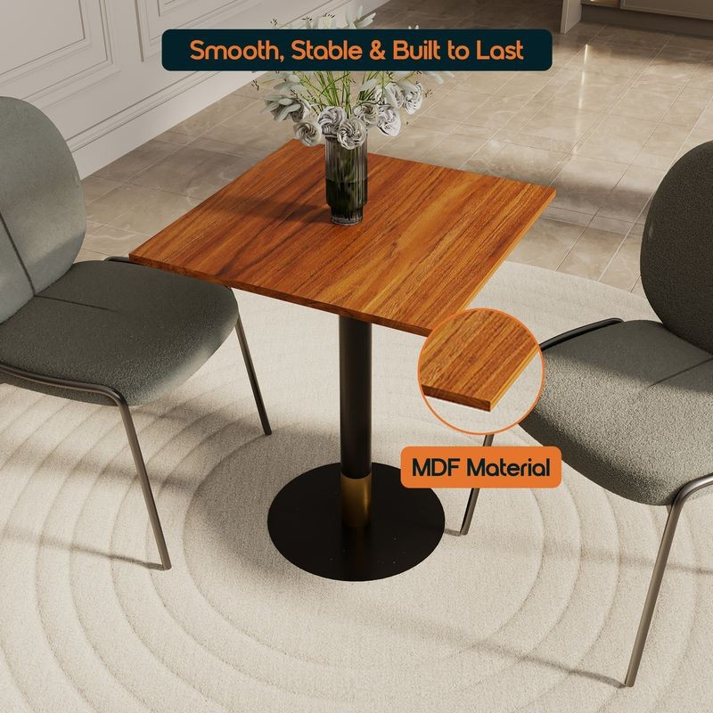 LeisureMod Vail Collection Dining Table Black/Gold Base With 24" Square Cognac Brown MDF Top in Room.