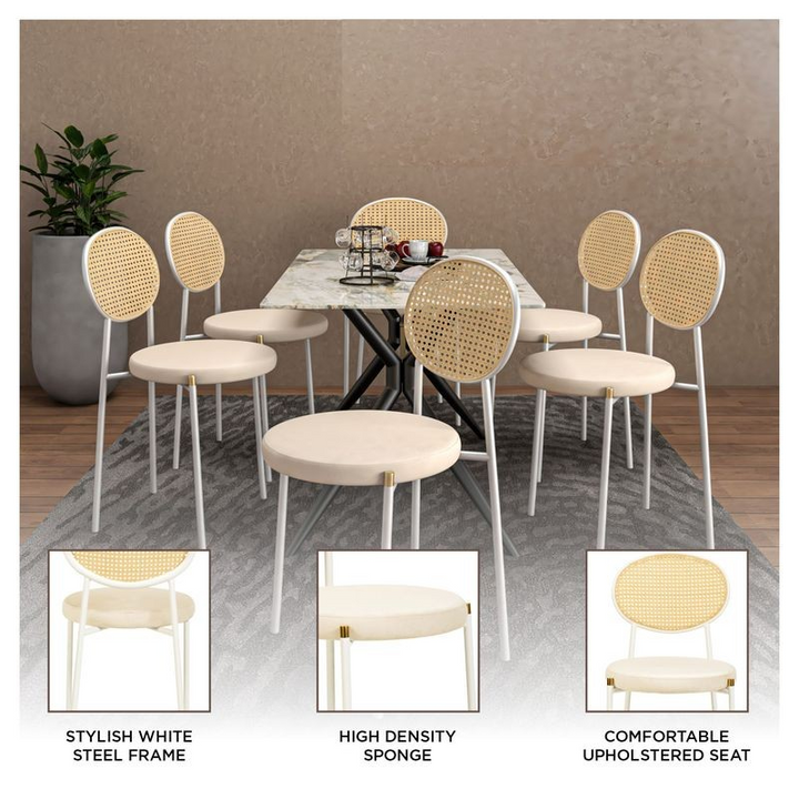 Dining set with chairs and a table on a wooden floor.