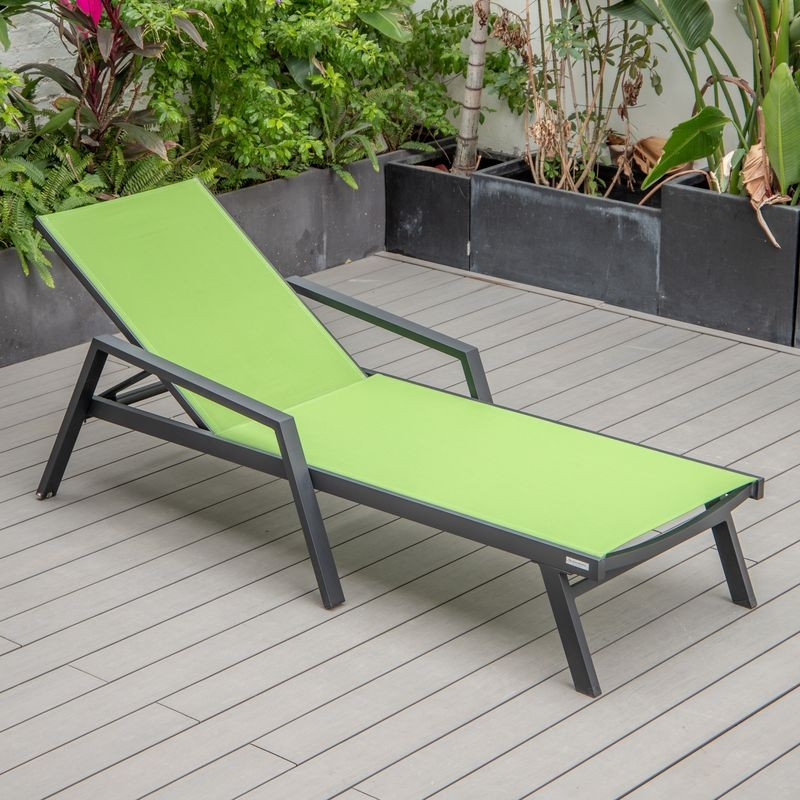 LeisureMod Marlin Patio Chaise Lounge Chair with Armrests in Black Aluminum Frame Green Photo.
