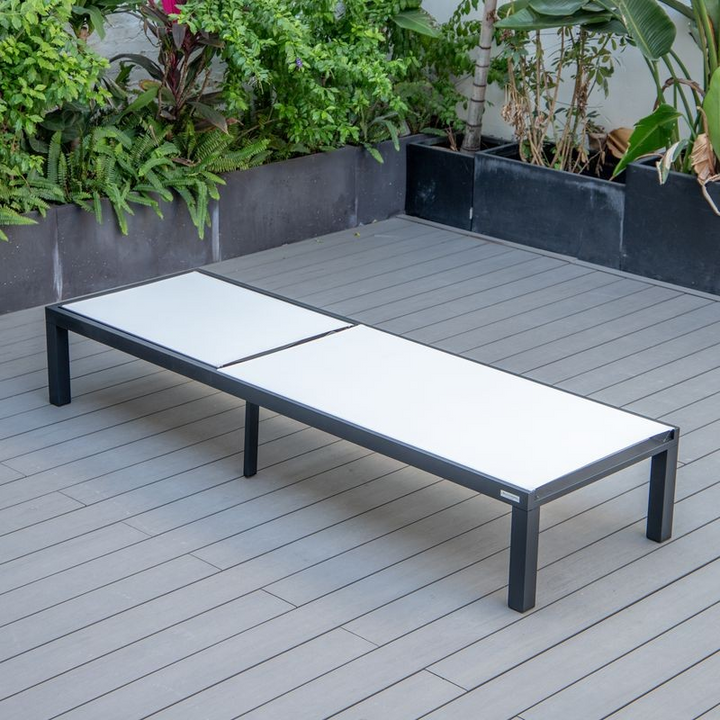LeisureMod Marlin Patio Chaise Lounge Chair with Black Aluminum Frame White Flat.