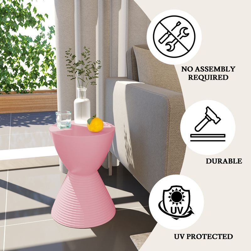 LeisureMod Modern Round Boyd Side Table Pink by Couch.