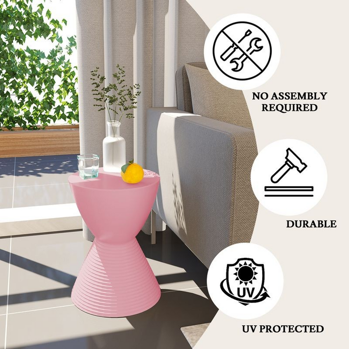 LeisureMod Modern Round Boyd Side Table Pink by Couch.