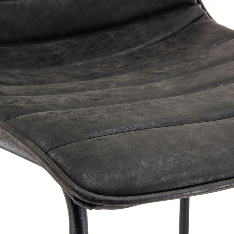 LeisureMod Brooklyn 29.9" Modern Leather Bar Stool with Black Iron Base and Footrest Closeup.
