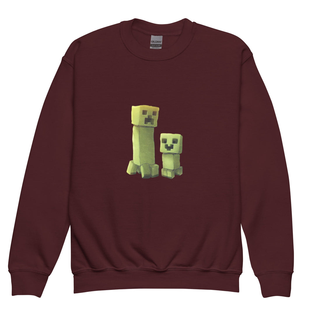Maroon sweatshirt with green pixelated characters on a white background.