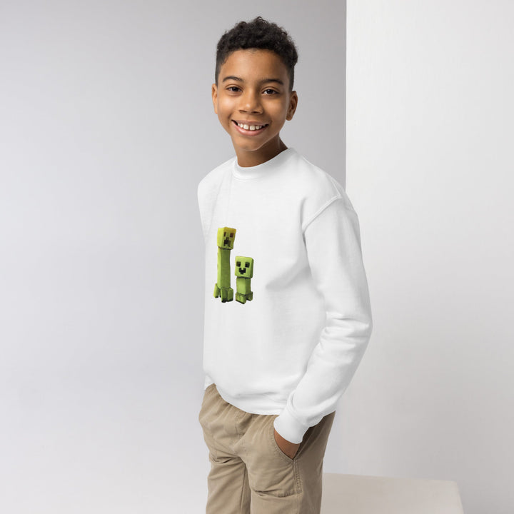 Child wearing a white sweatshirt with Minecraft character design on a plain background.
