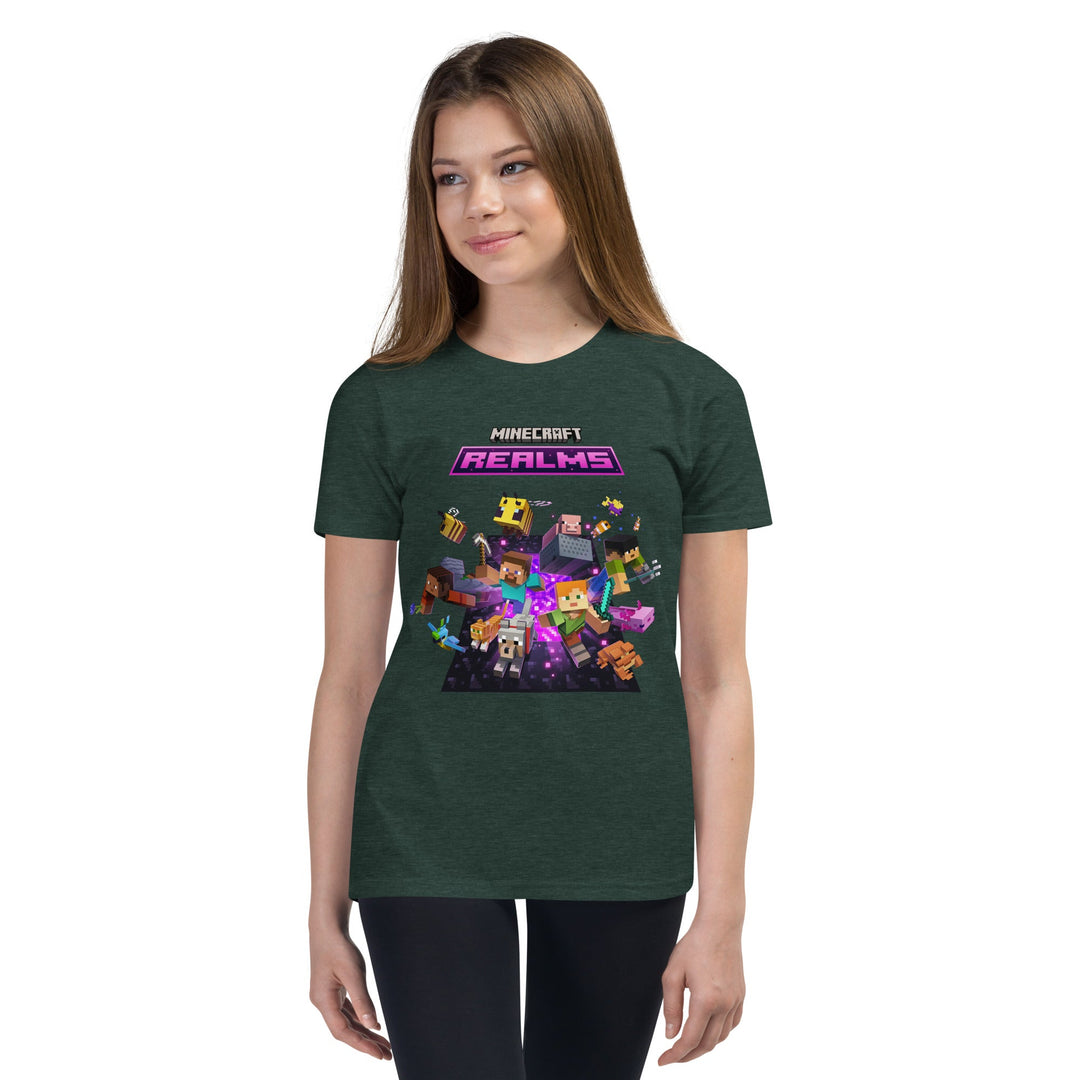 Person wearing a green t-shirt with Minecraft Realms graphics on a white background.