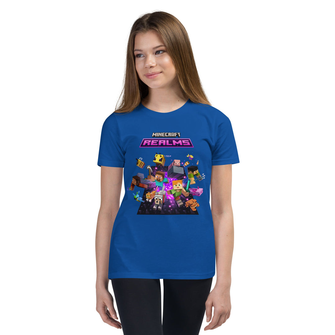 Person wearing a blue t-shirt with Minecraft Realms graphics on a white background.