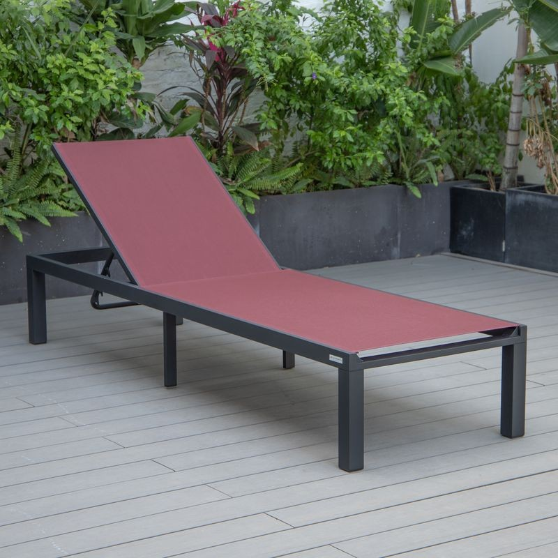 LeisureMod Marlin Patio Chaise Lounge Chair with Black Aluminum Frame Burgundy on Deck.