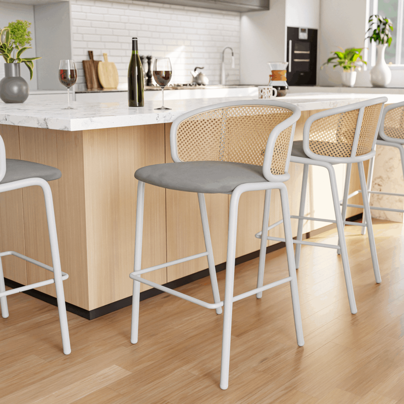 LeisureMod Ervilla Mid-Century Modern Wicker Bar Stool with Fabric Seat and White Powder Coated Steel Frame for Kitchen and Dining Room in Grey at Bar.