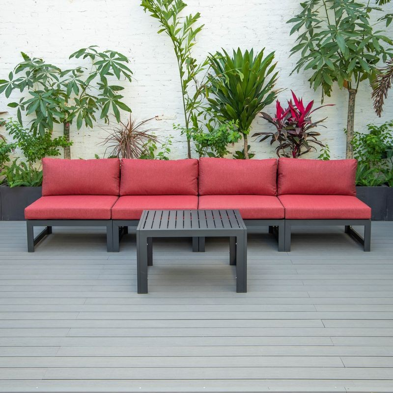 LeisureMod Chelsea 5-Piece Middle Patio Chairs and Coffee Table Set Black Aluminum with Cushions Red on Deck.
